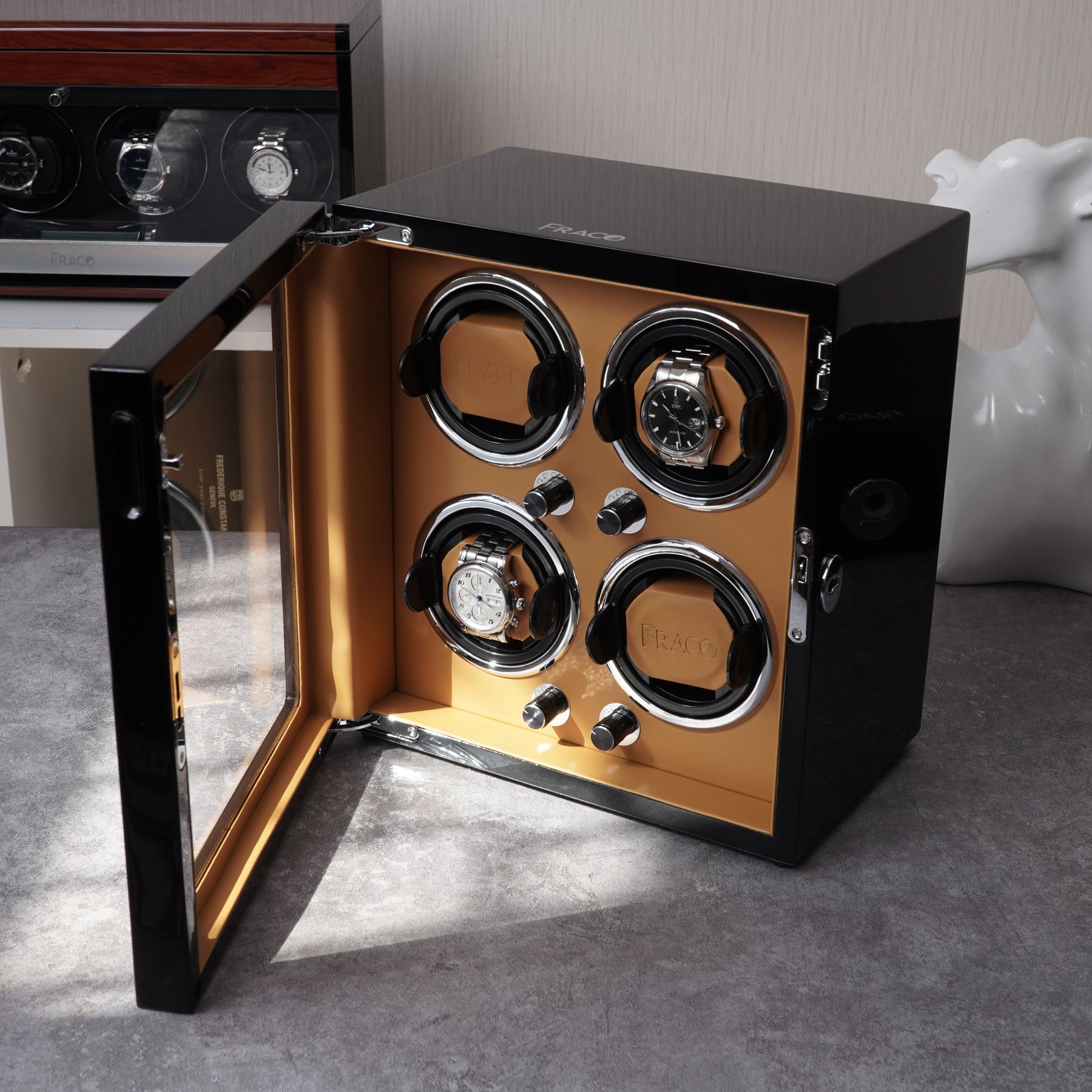 Four-position watch winder cabinet with individual controls and watch cushions