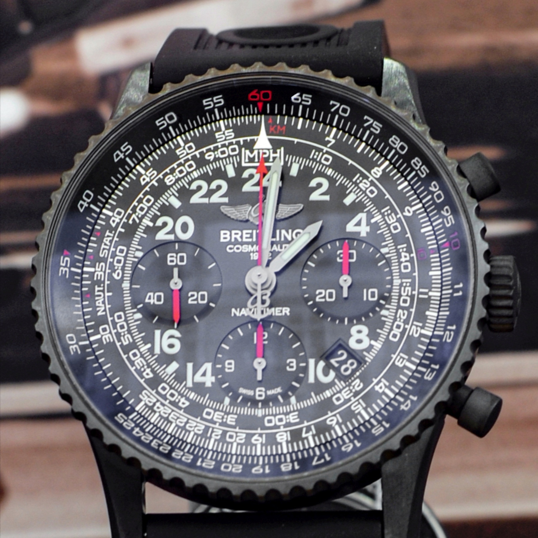 Black Breitling Navitimer Cosmonaute chronograph with circular slide rule and 24-hour dial