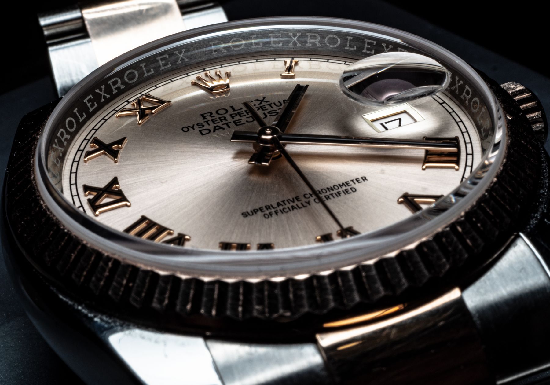 Close-up of a Rolex Datejust dial, fluted bezel and Cyclops date display